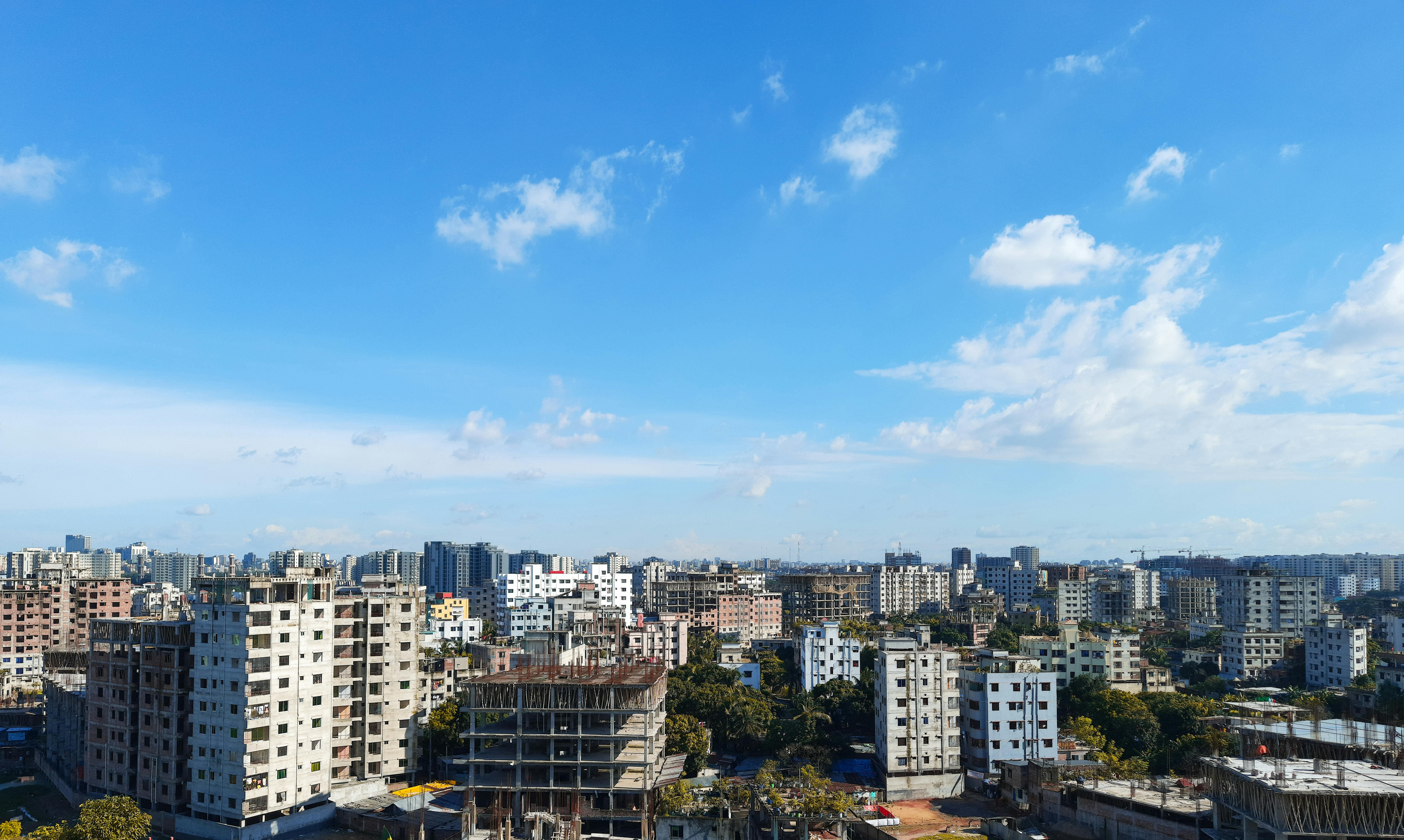A drone shot of a clean and sunny Dhaka city